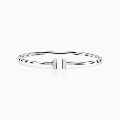 TIFFANY T. SLIM WHITE GOLD BRACELET